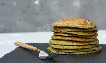 Stack of healthy spinach protein pancakes